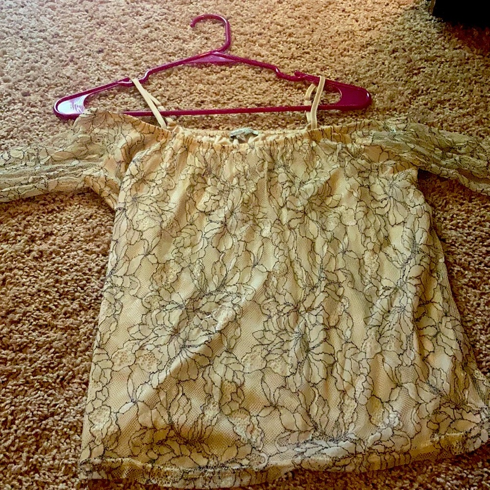 Charlotte Russe off the shoulder lace cream and black top .